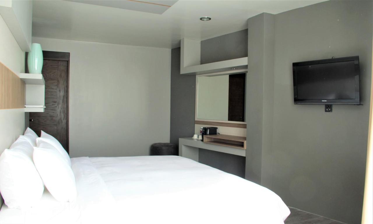 Esduma Hk Hotel Pachuca Bagian luar foto