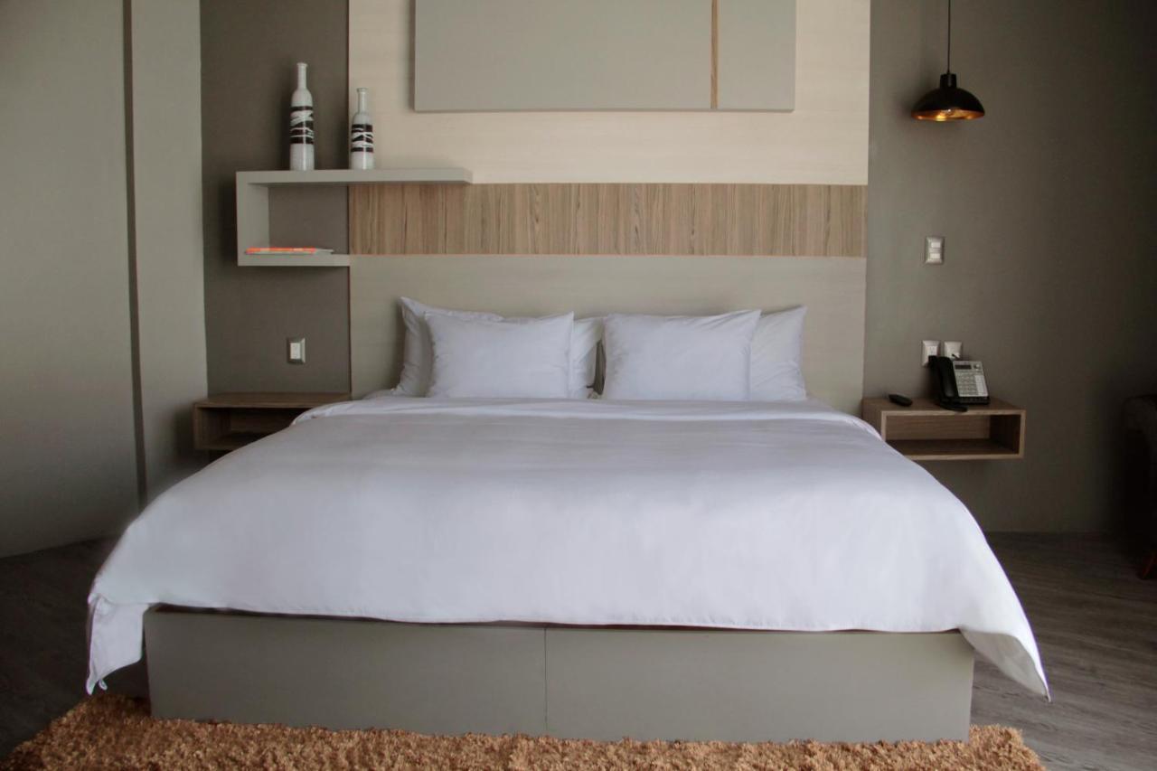 Esduma Hk Hotel Pachuca Bagian luar foto