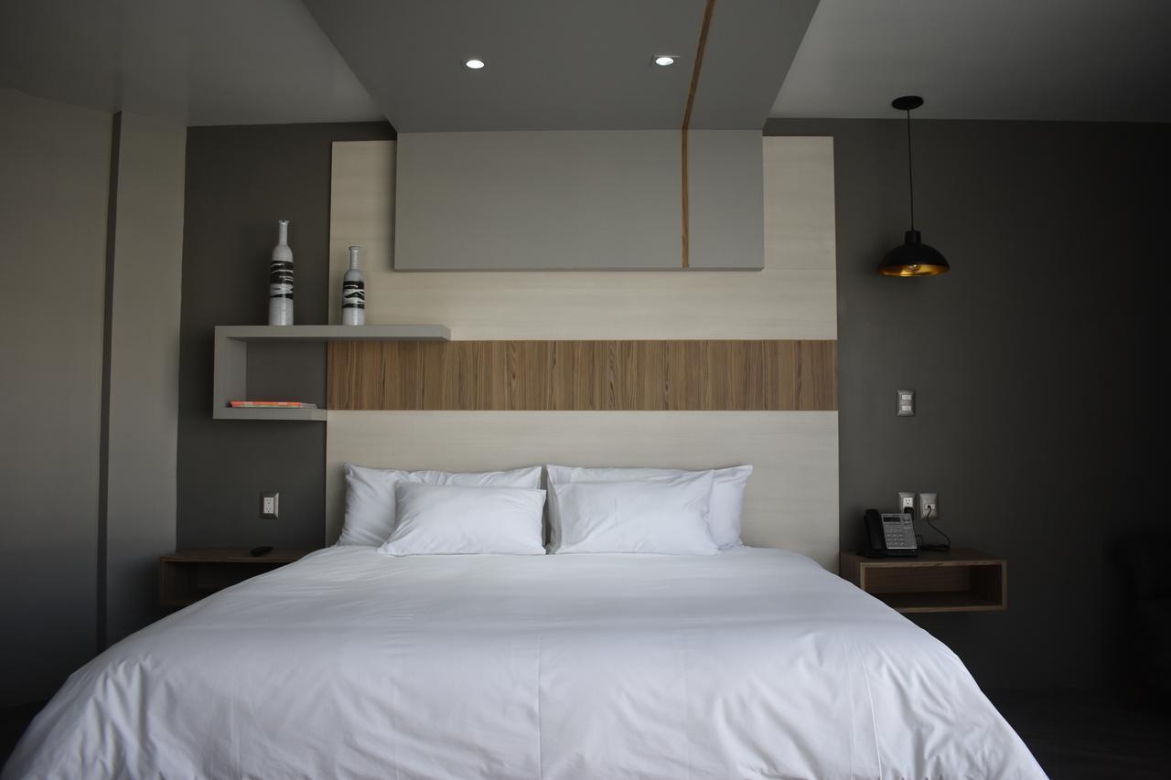 Esduma Hk Hotel Pachuca Bagian luar foto