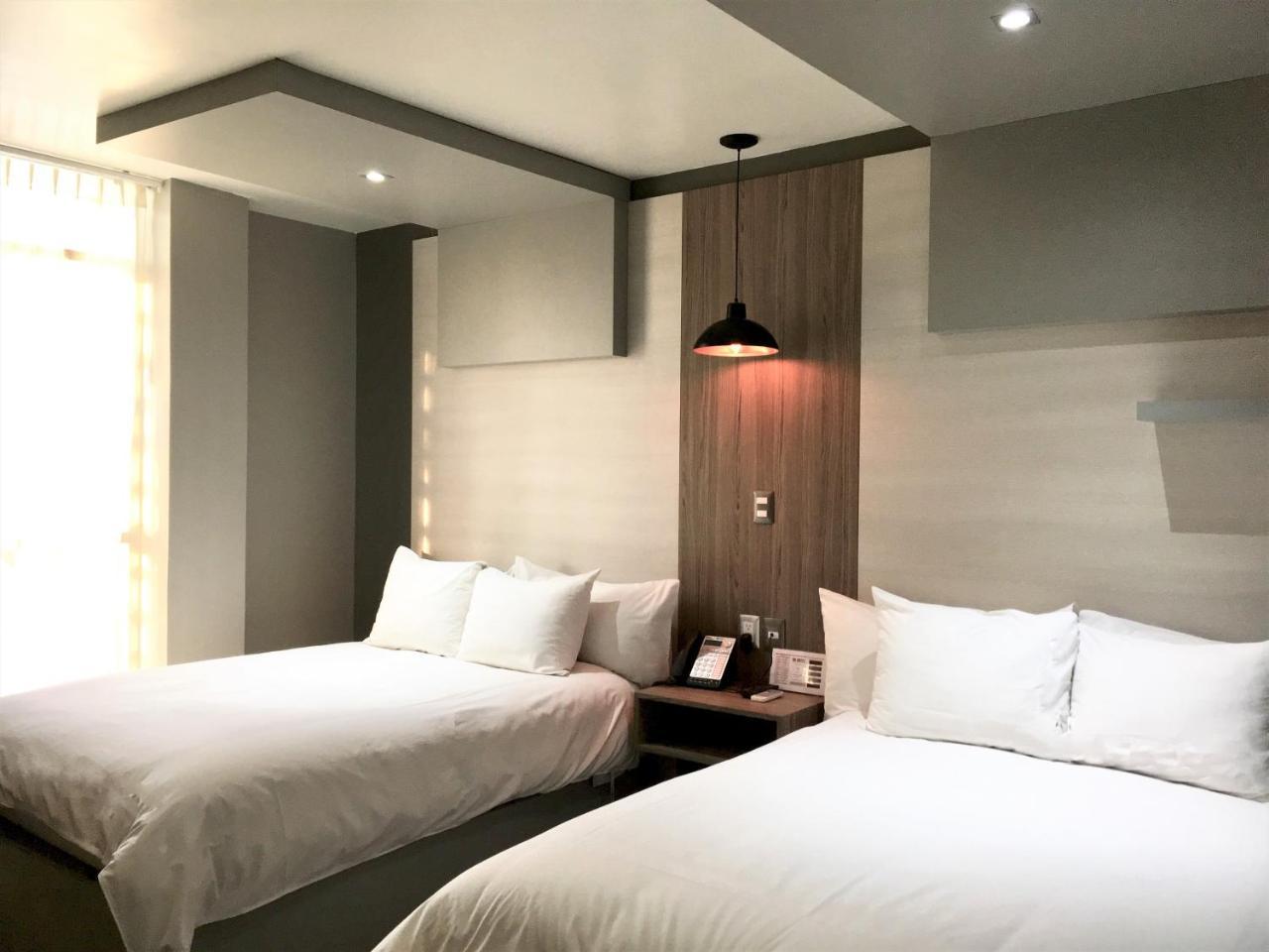 Esduma Hk Hotel Pachuca Bagian luar foto